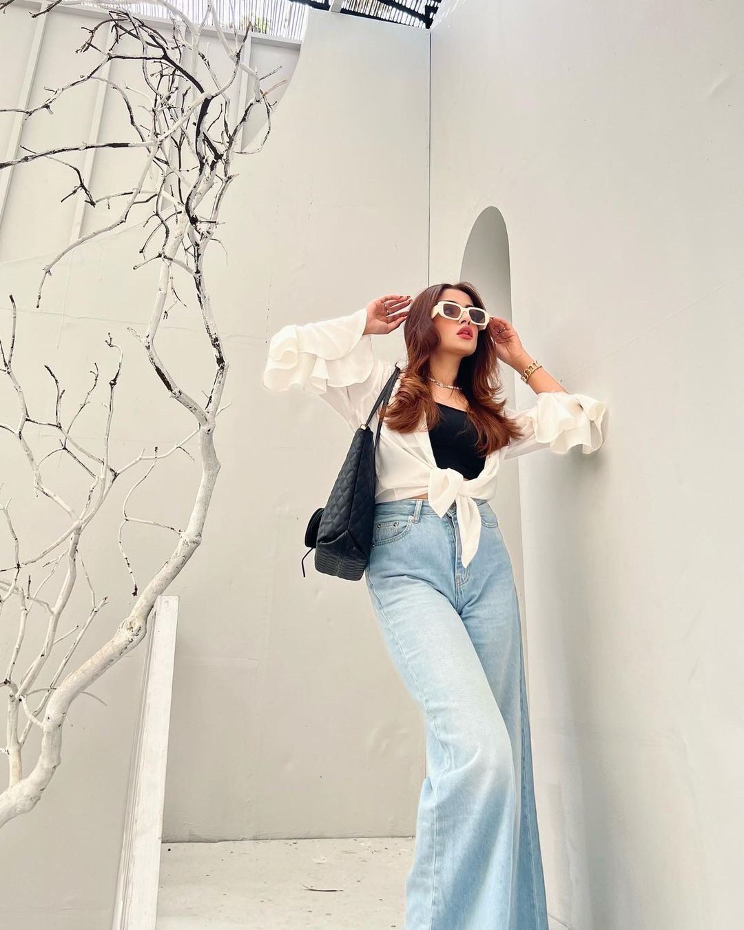 Wide leg raw hem ice blue jeans